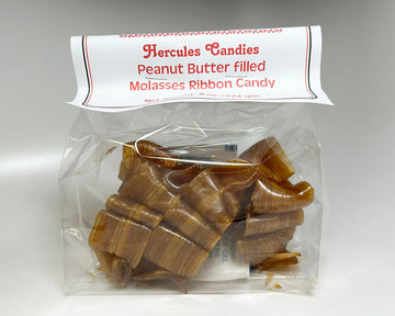 peanut butter filled molasses ribbon candy  droopy from humidity