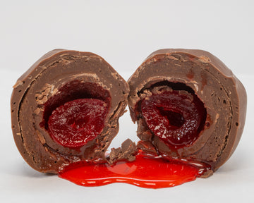 milk chocolate cherry truffle bomb cut open