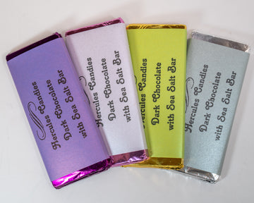 dark chocolate sea salt candy bars in 4 different colored wrappers